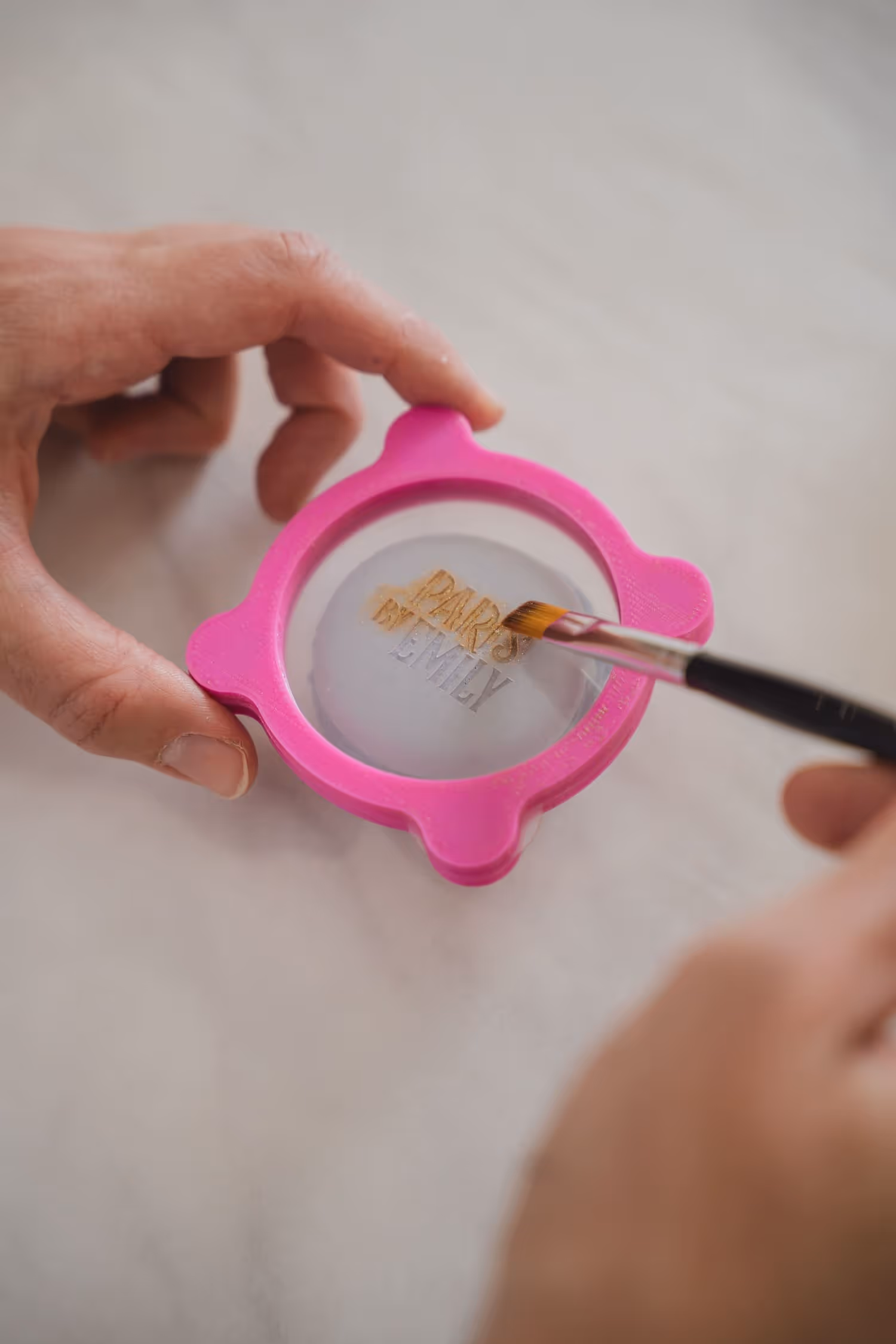 Macaron making decorating a macaron with edible paint