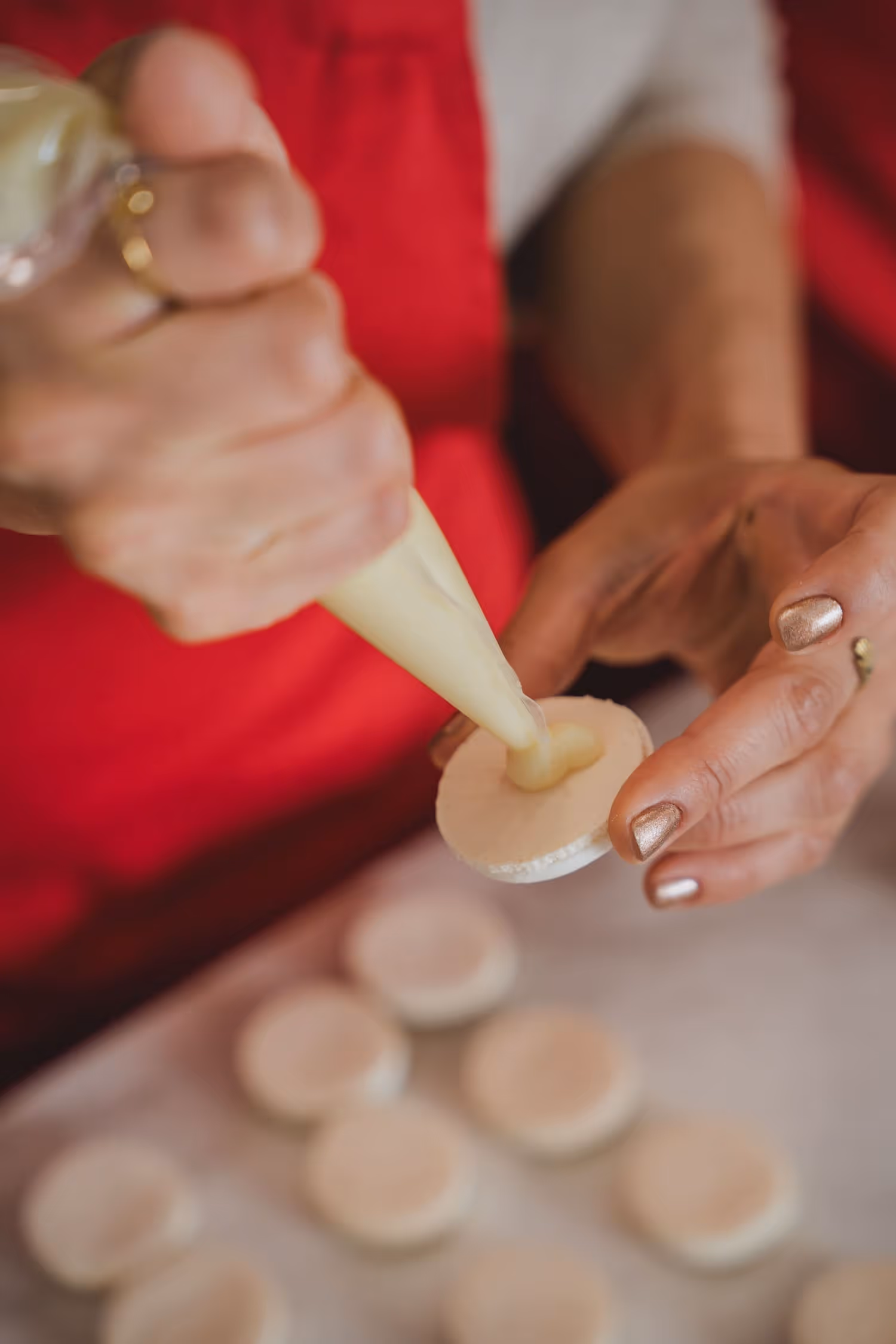 Macaron making filling the macarons