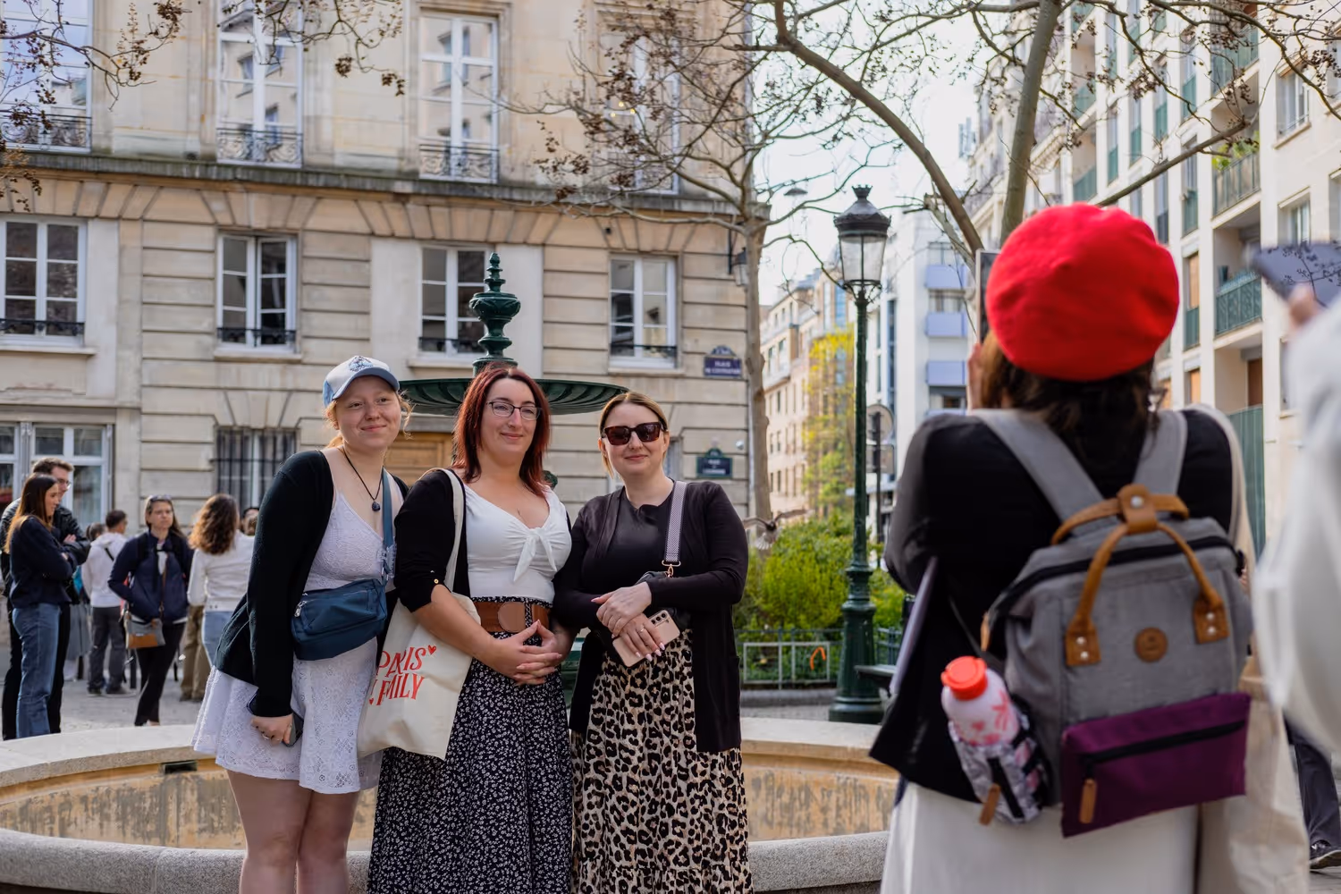 Walking Tour emily in paris guests posing for photo outside emilys apartment